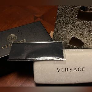 Hardshell glasses case by Versace. with original box and cloth